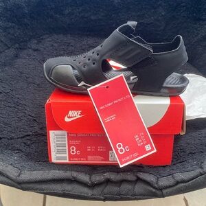 Brand new Nike slippers